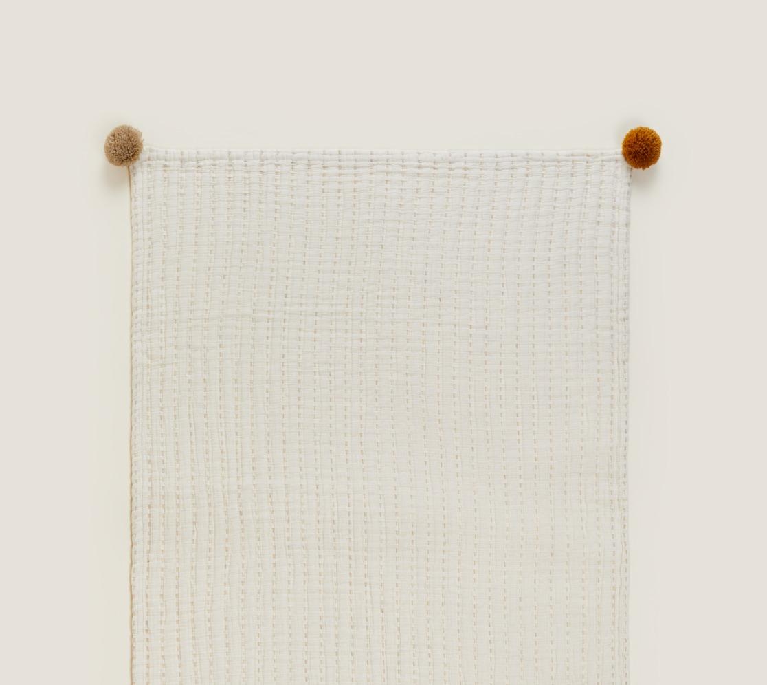 Home | Pom Pom Swaddle